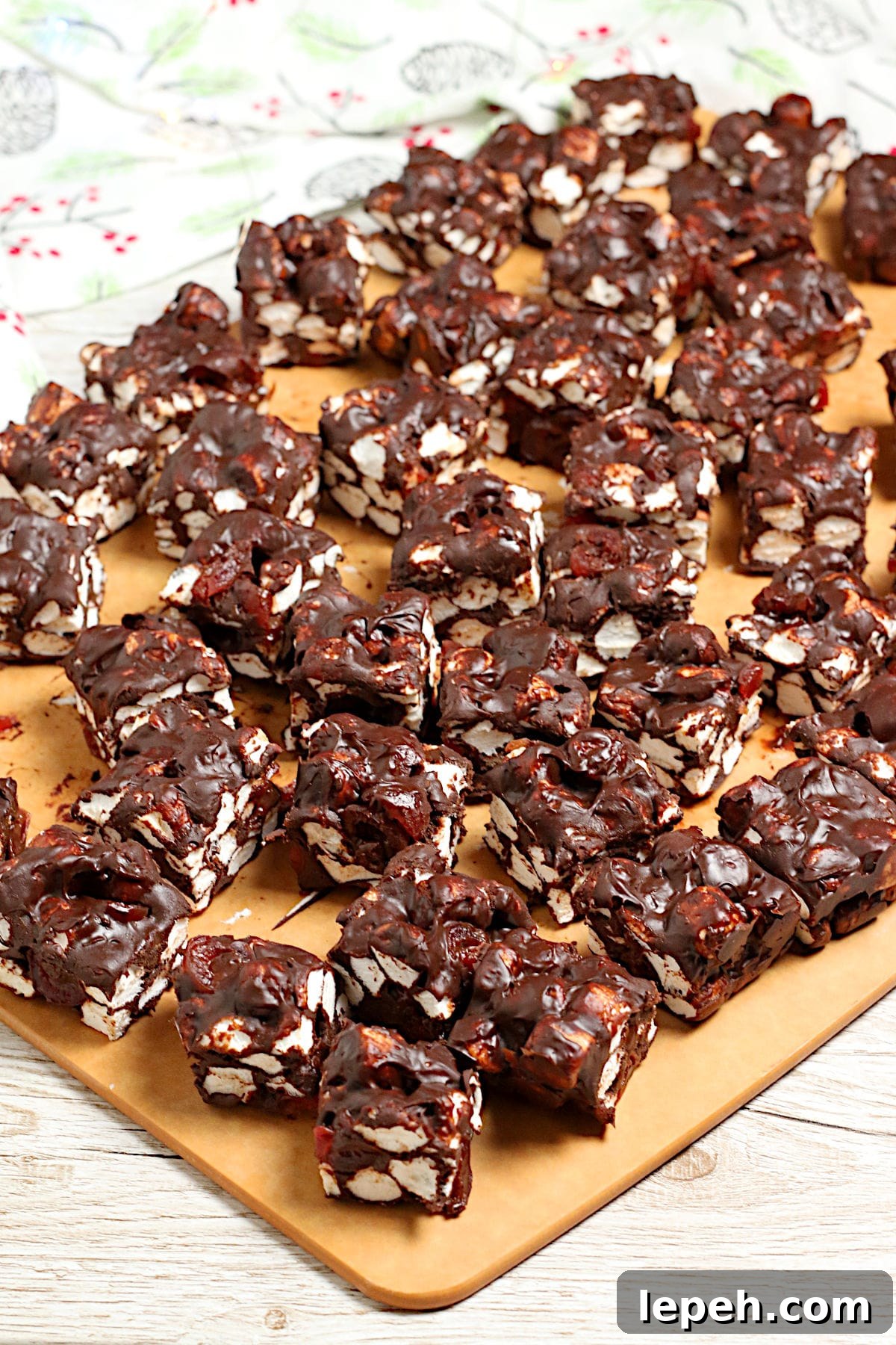 Chocolate Cherry Marshmallow Squares on a cutting board.