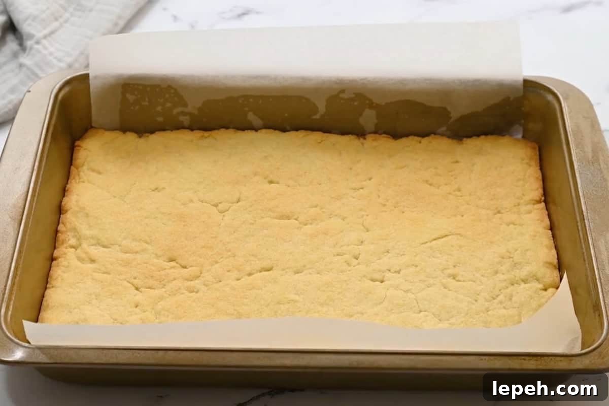 baked shortbread crust in a baking pan.