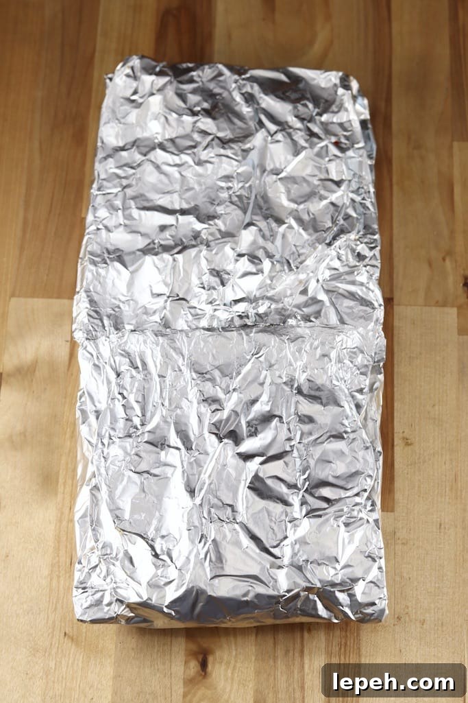 Foil packet filled with potatoes for grilling