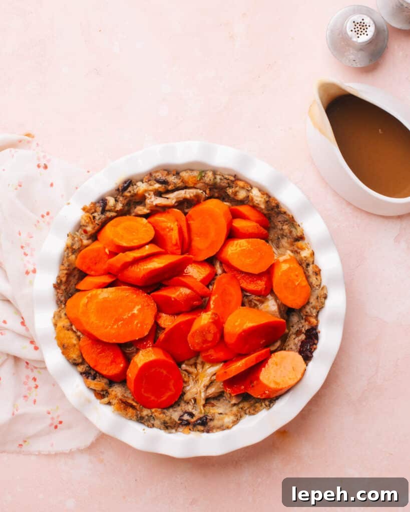 Add vegetables to pie dish.