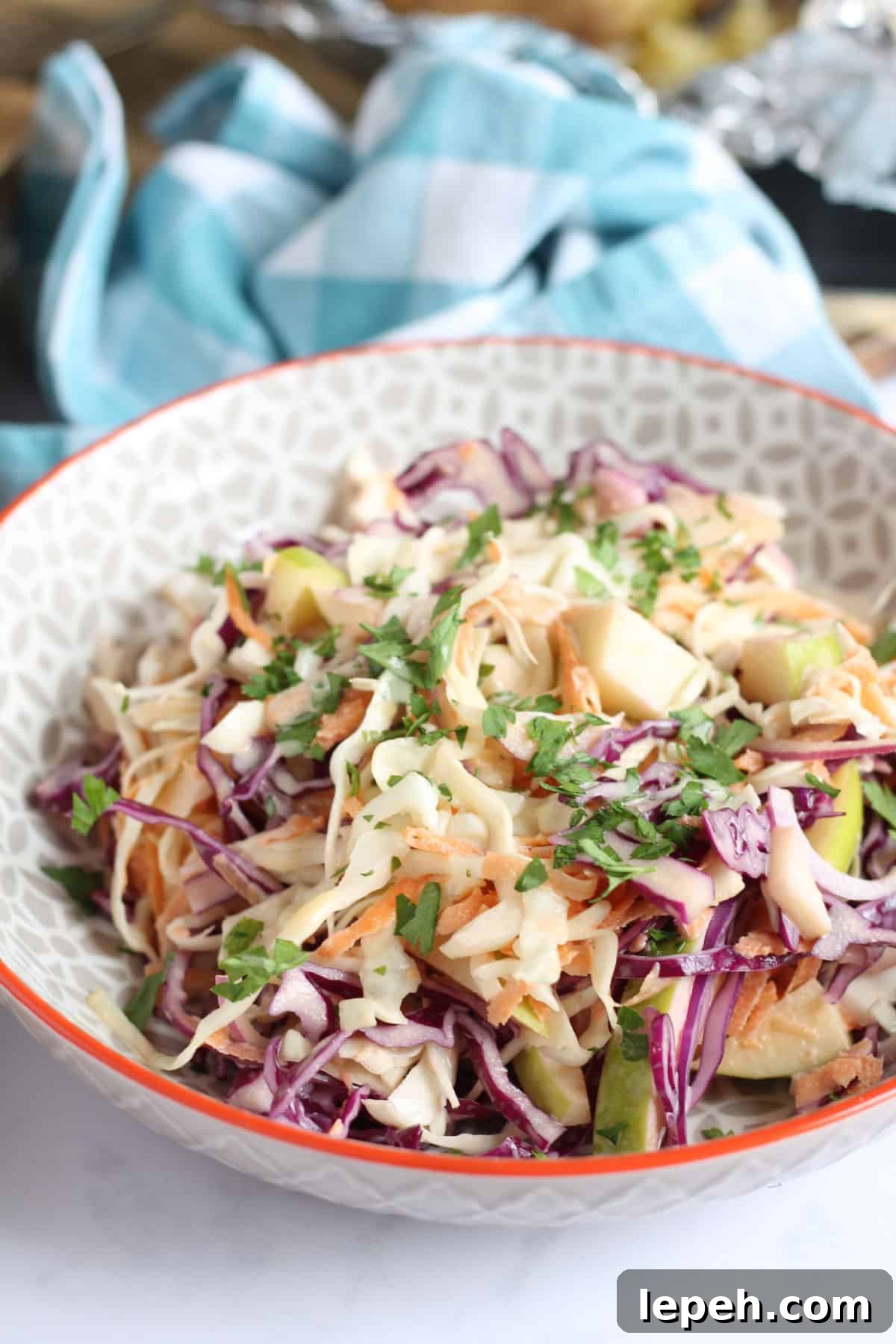 Apple coleslaw in a bowl.
