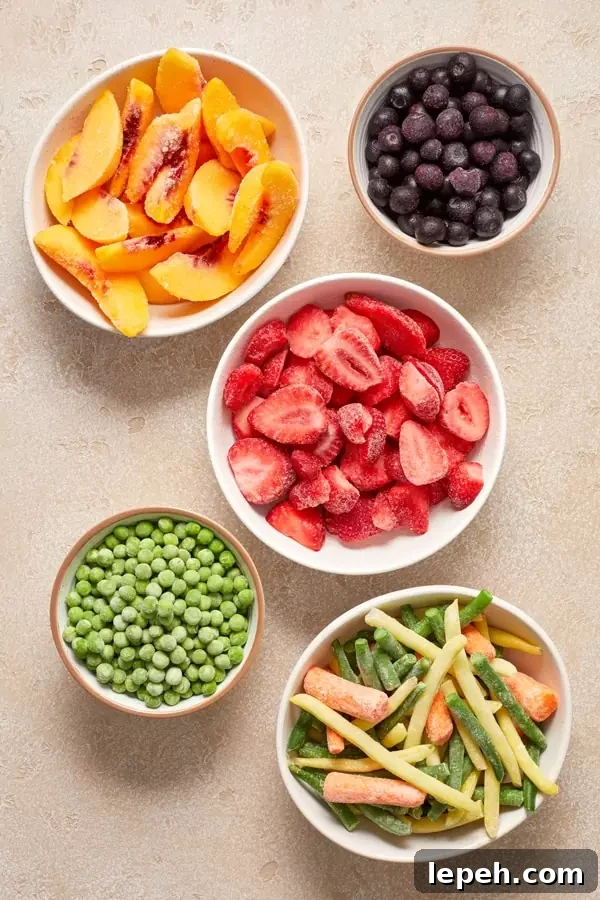 Frozen fruits and veggies in small bowls.