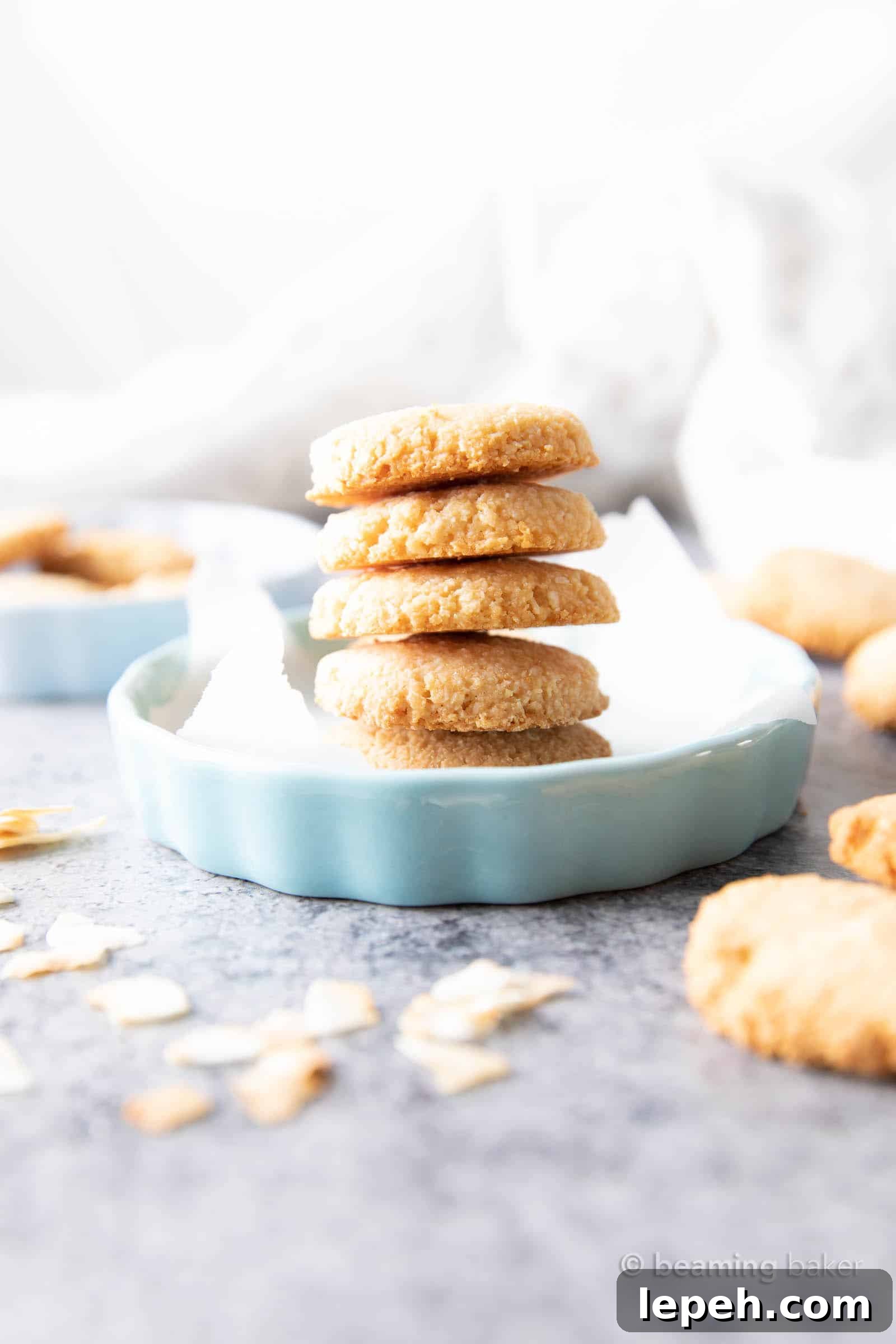 Vegan Coconut Cookies: an easy 4 ingredient recipe for crunchy, crispy vegan cookies packed with three kinds of coconut!