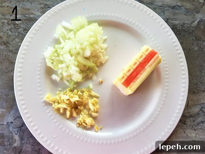 chopped onion and garlic with butter on the plate.