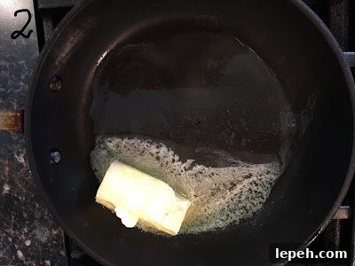 Butter molten on heated pan.