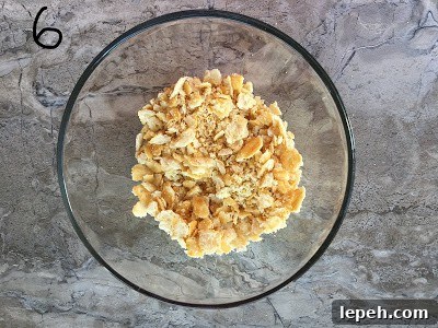 Crackers crushed in a bowl.