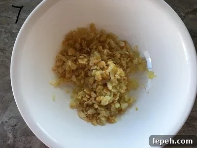 Crackers mixed with sautéed onion and garlic.