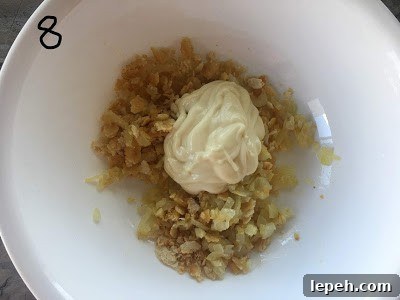 Mayonnaise with cracker mixture.