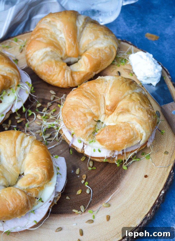 nutty bird sandwich shown on a wooden cutting board