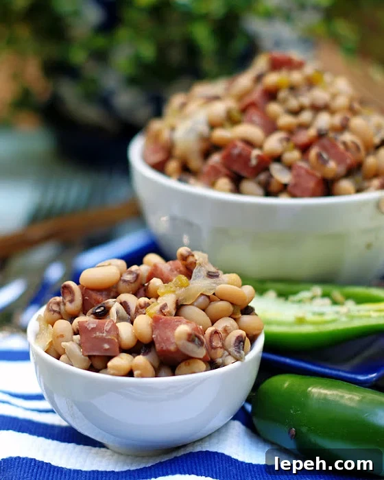An easy crock pot black eyed peas recipe with ham and jalapenos