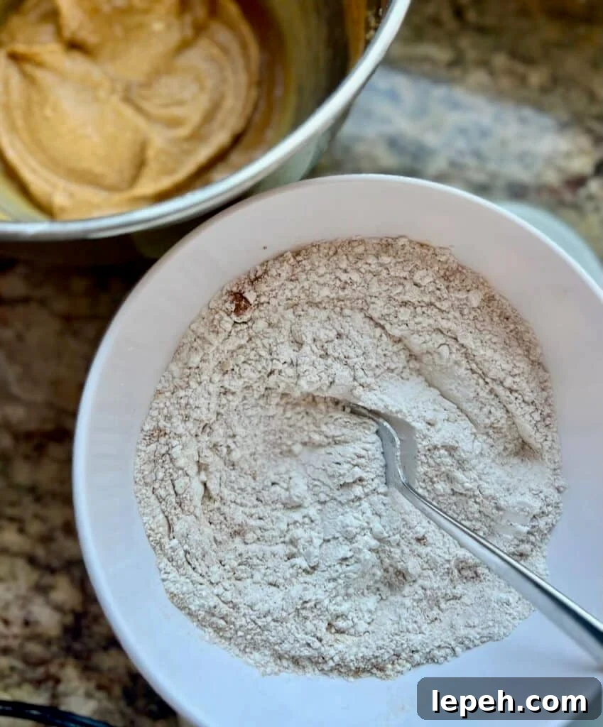 A bowl of wet and dry ingredients used to mix up the cookie dough.