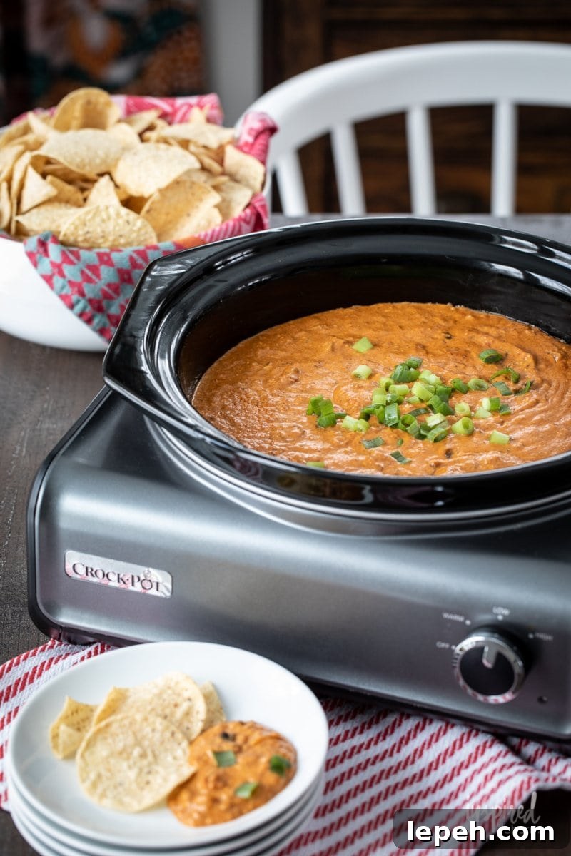 chili cheese appetizer with tortilla chips