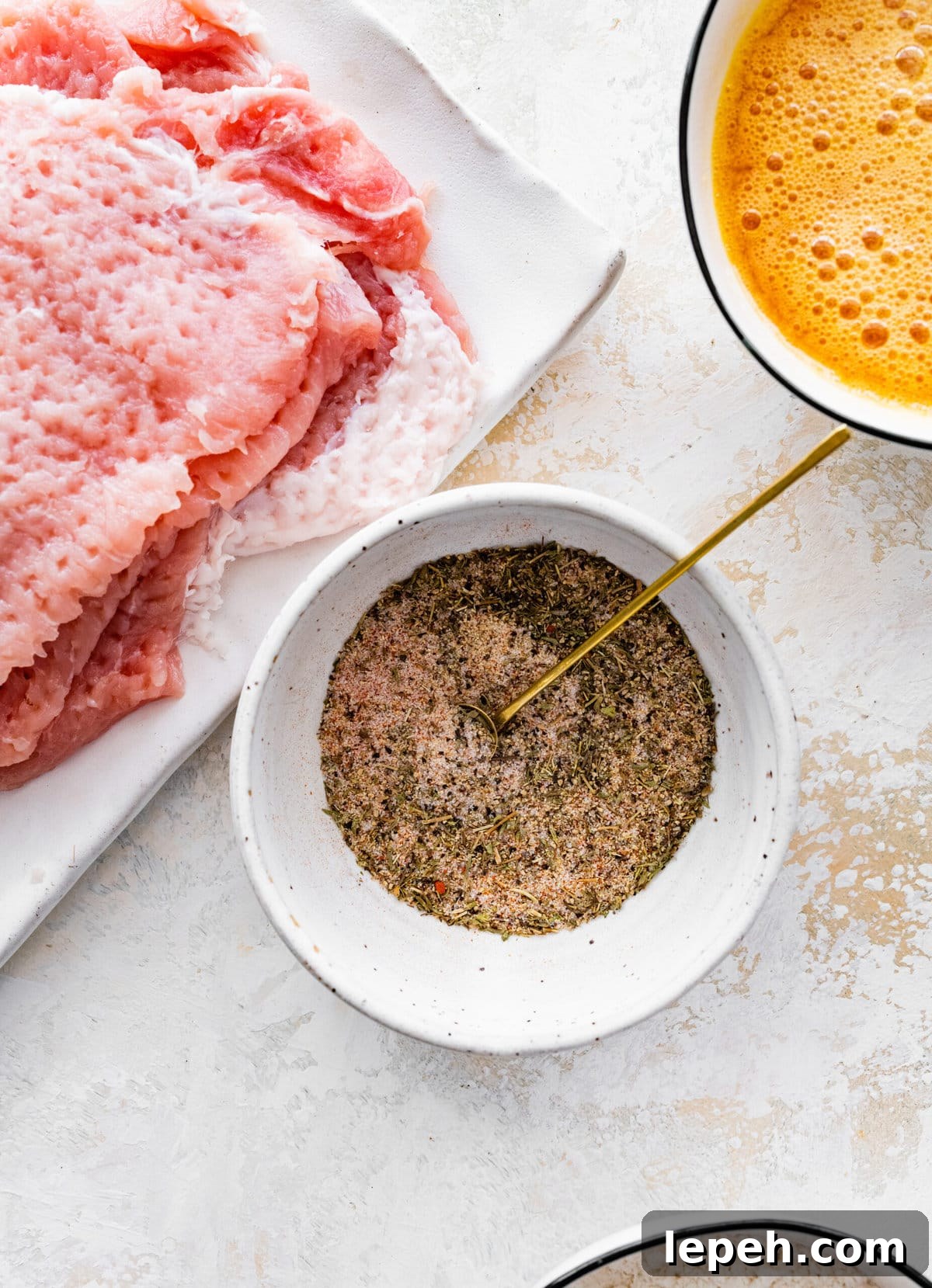 Making the seasoning for the pork chops.