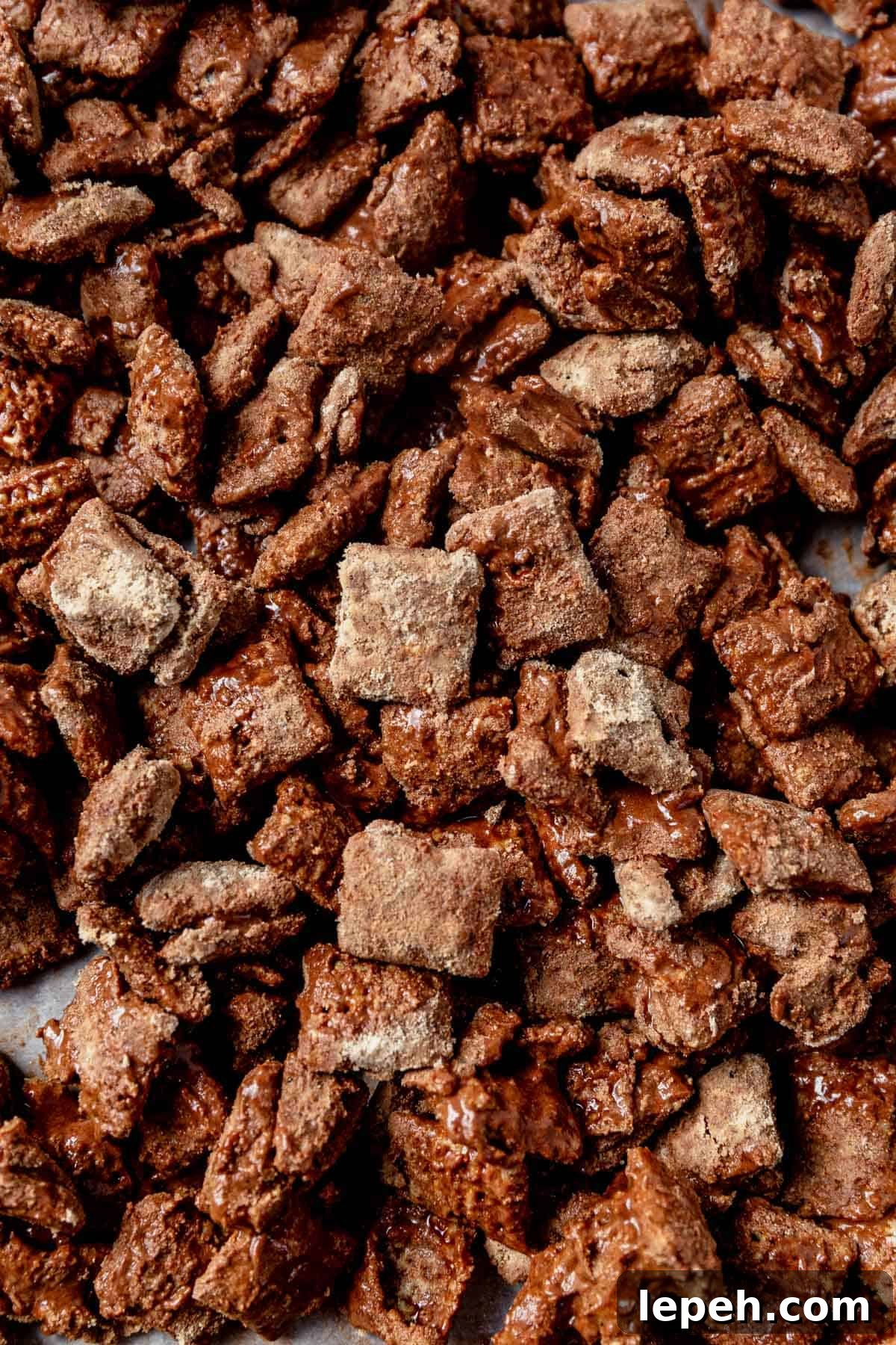 protein puppy chow spread out on a sheet pan