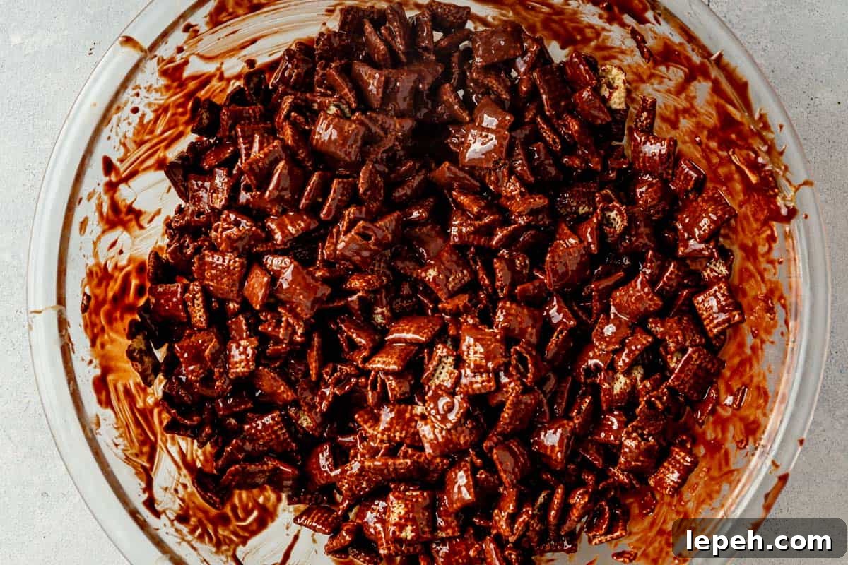 chex cereal covered in melted chocolate and peanut butter