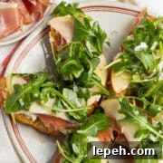 This is a square picture of the burrata crostini.