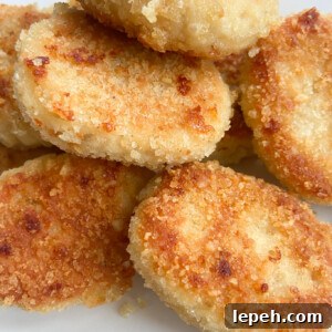 Leftover turkey nuggets served on a white plate