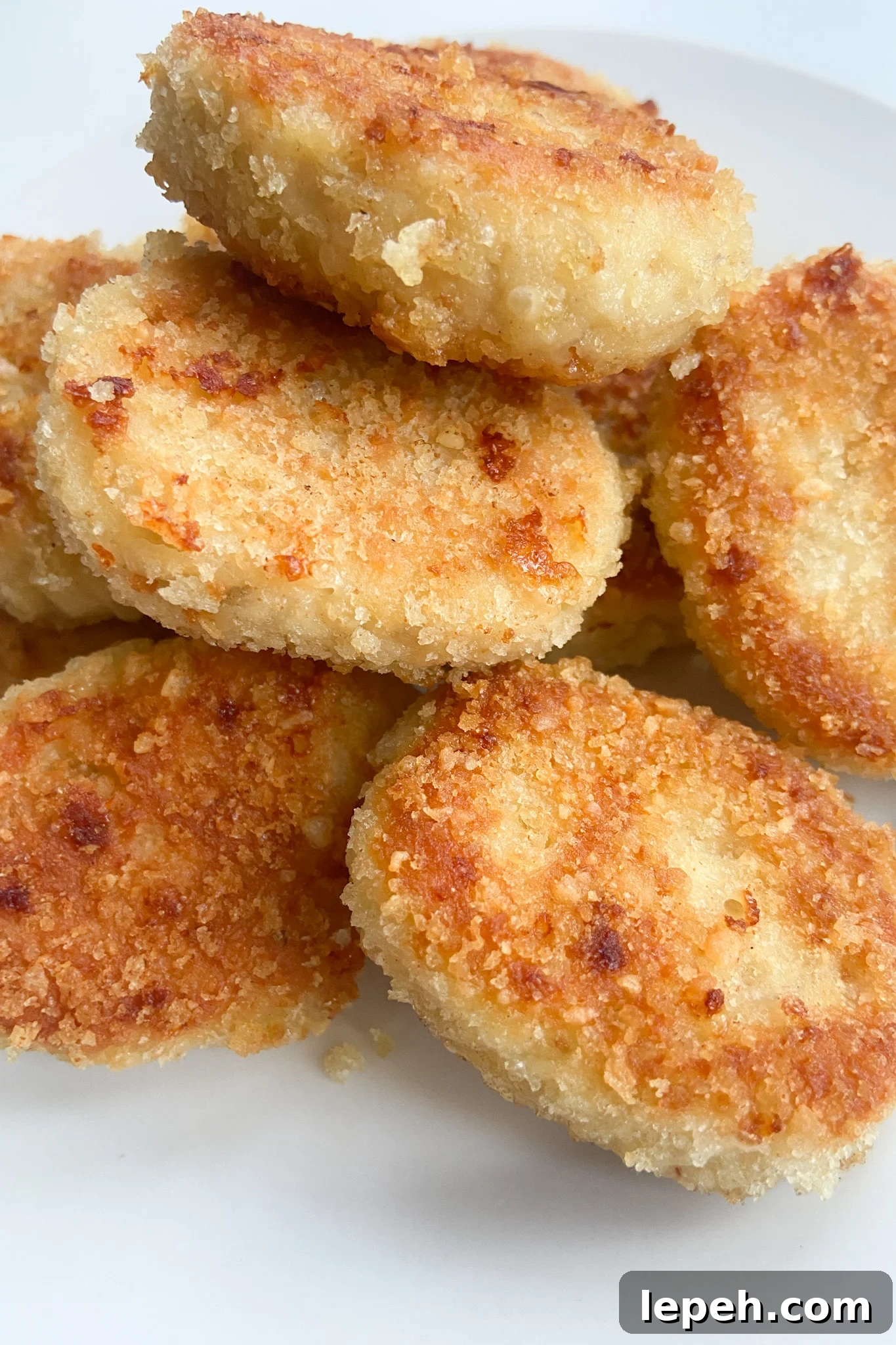 Leftover turkey nuggets served on a white plate