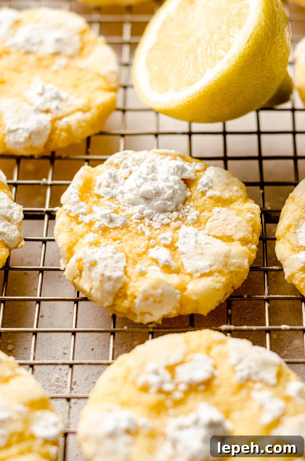 lemon crinkle cookies on a cooling rack