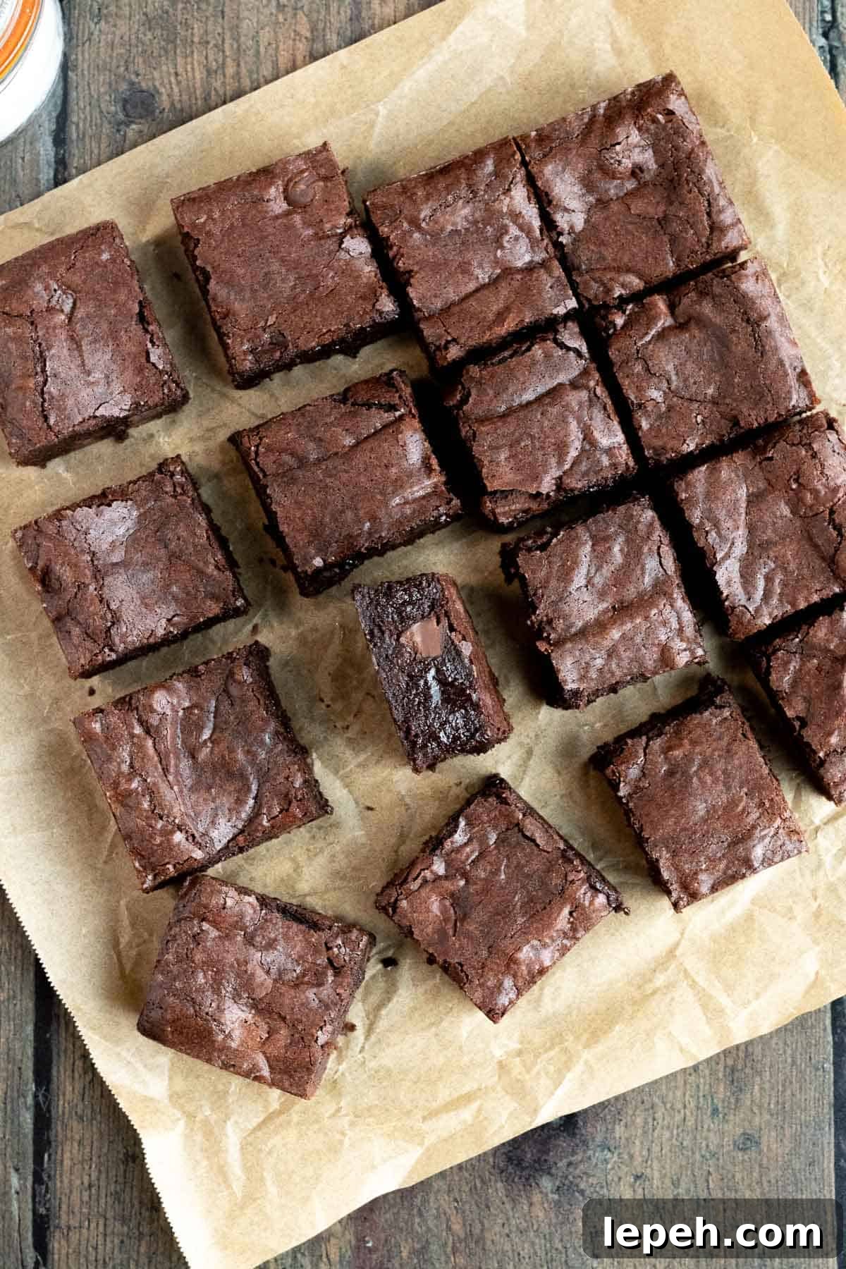 overhead view of dark chocolate brownies cut into squares