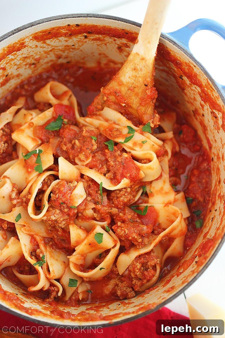 30-Minute Weeknight Pasta Sauce – Simmer this scrumptious, meaty pasta sauce for just 30 minutes, serve a salad alongside, and dinner is done! | thecomfortofcooking.com