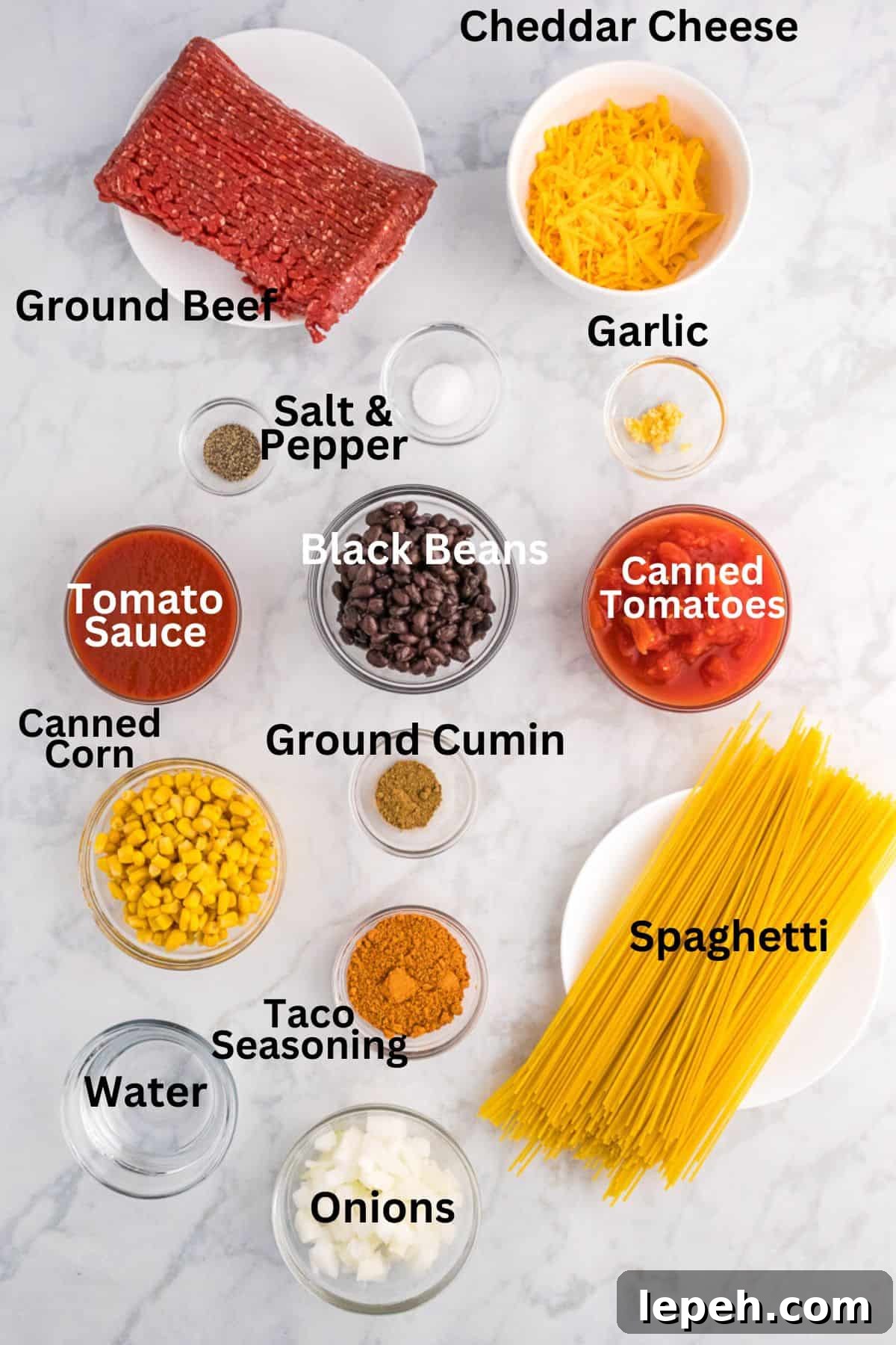 Labelled ingredients for taco spaghetti recipe.