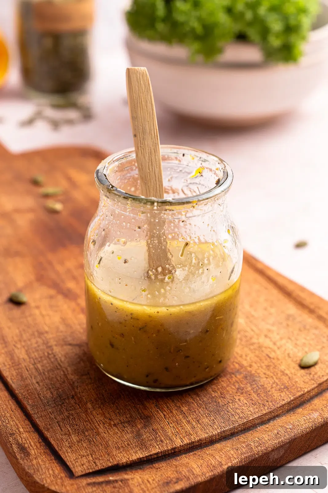 stirring red wine vinaigrette