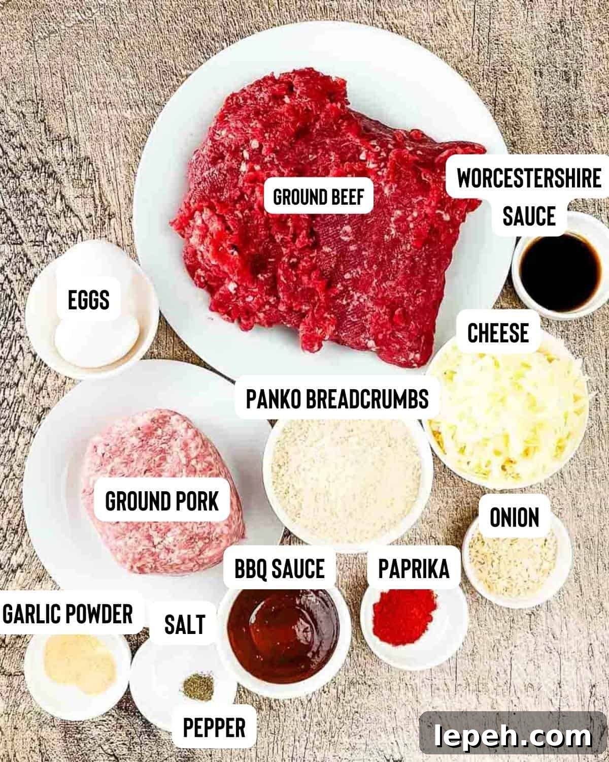 Smoked meatloaf ingredients measured out and placed on a wooden table.