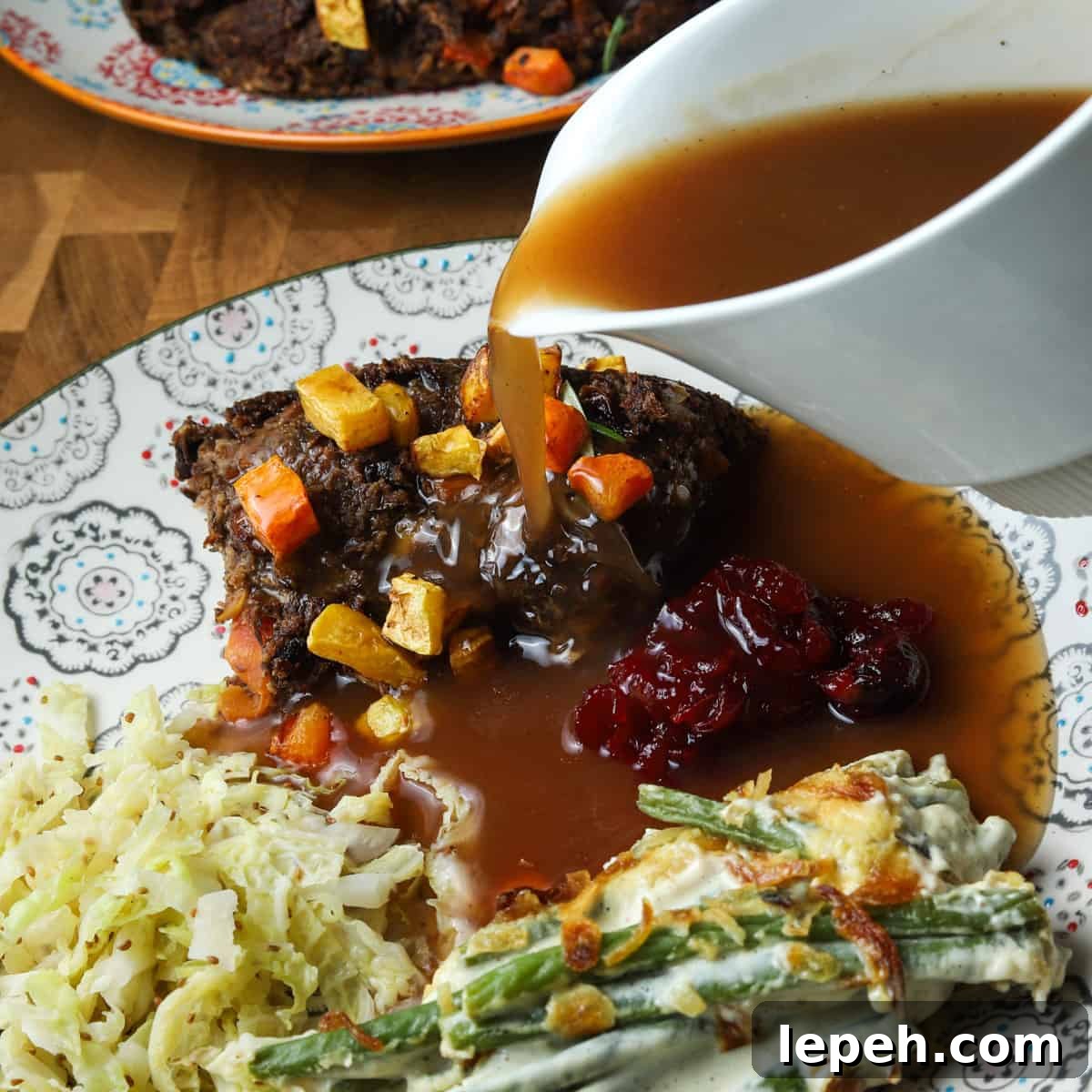 Photo of a full vegan roast meal with onion gravy