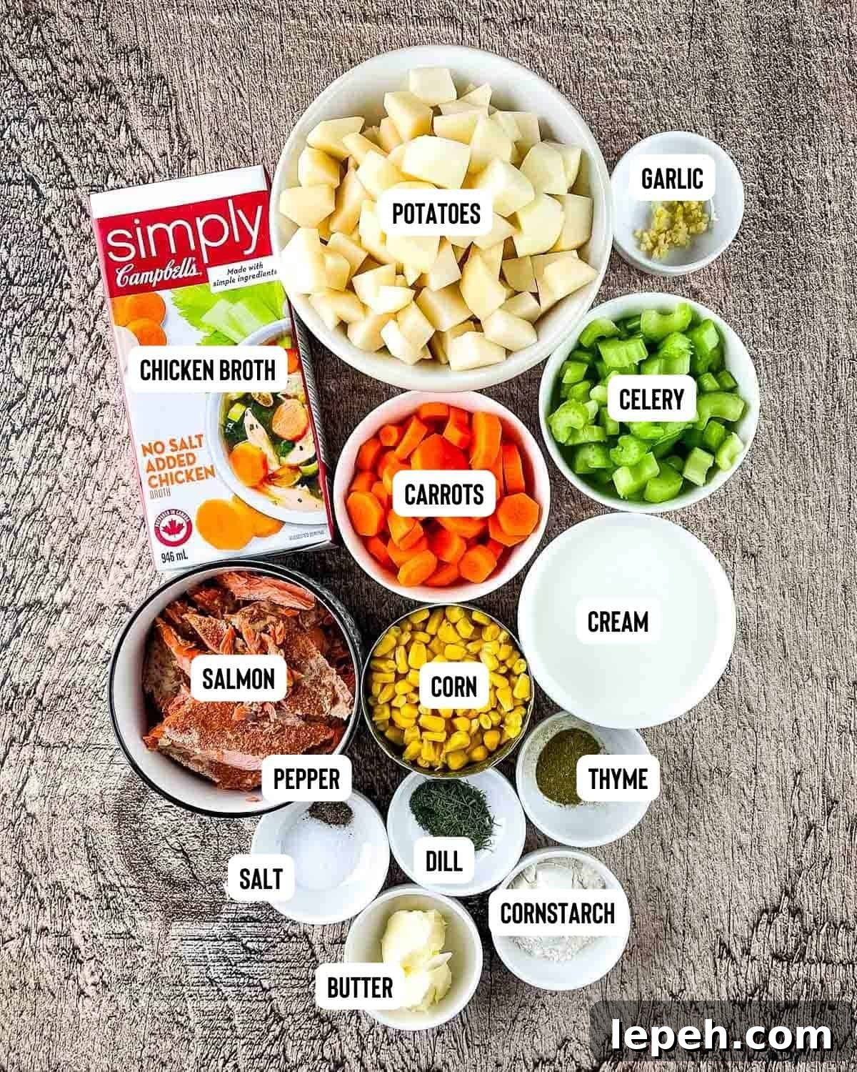 Ingredients for Instant Pot salmon chowder placed on a wooden table.