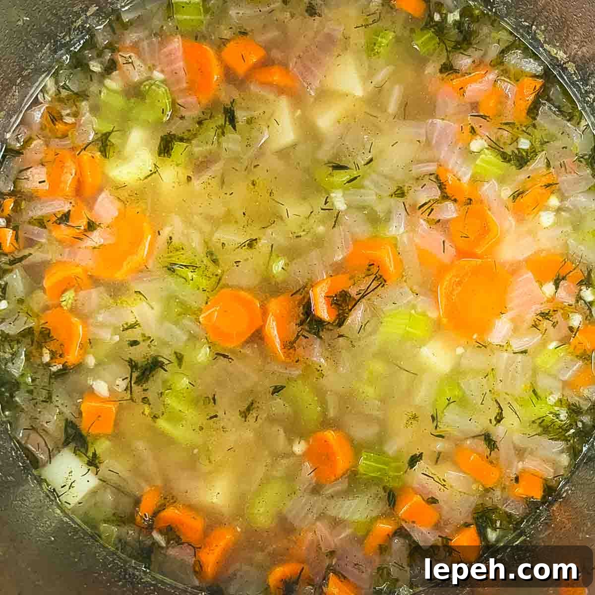 The vegetables in the pot after they are cooked and the pressure quick released.