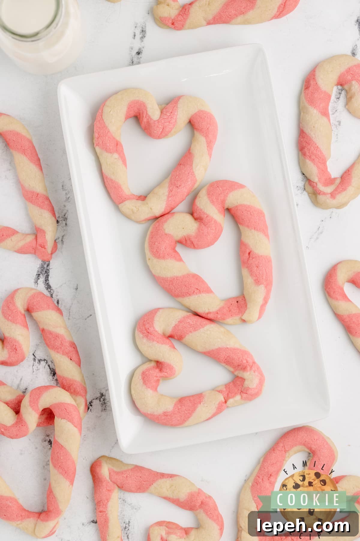 Pink and white striped heart cookies.