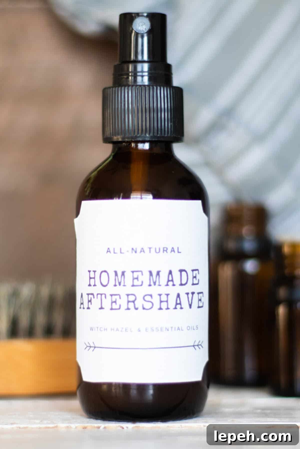A bottle of homemade aftershave with a printed label.