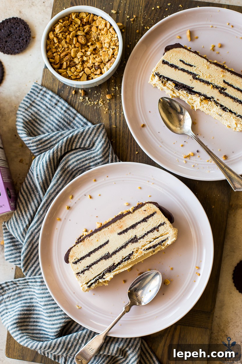 Overhead photo of two plates with a slice of peanut butter ice box cake and spoons