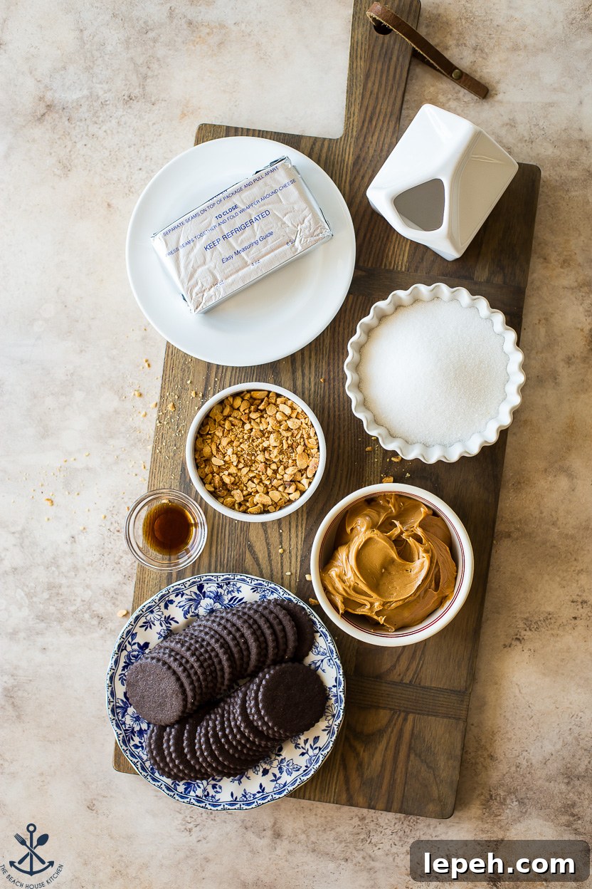 Overhead photo of ingredients for a peanut butter chocolate cookie cake on a wooden board