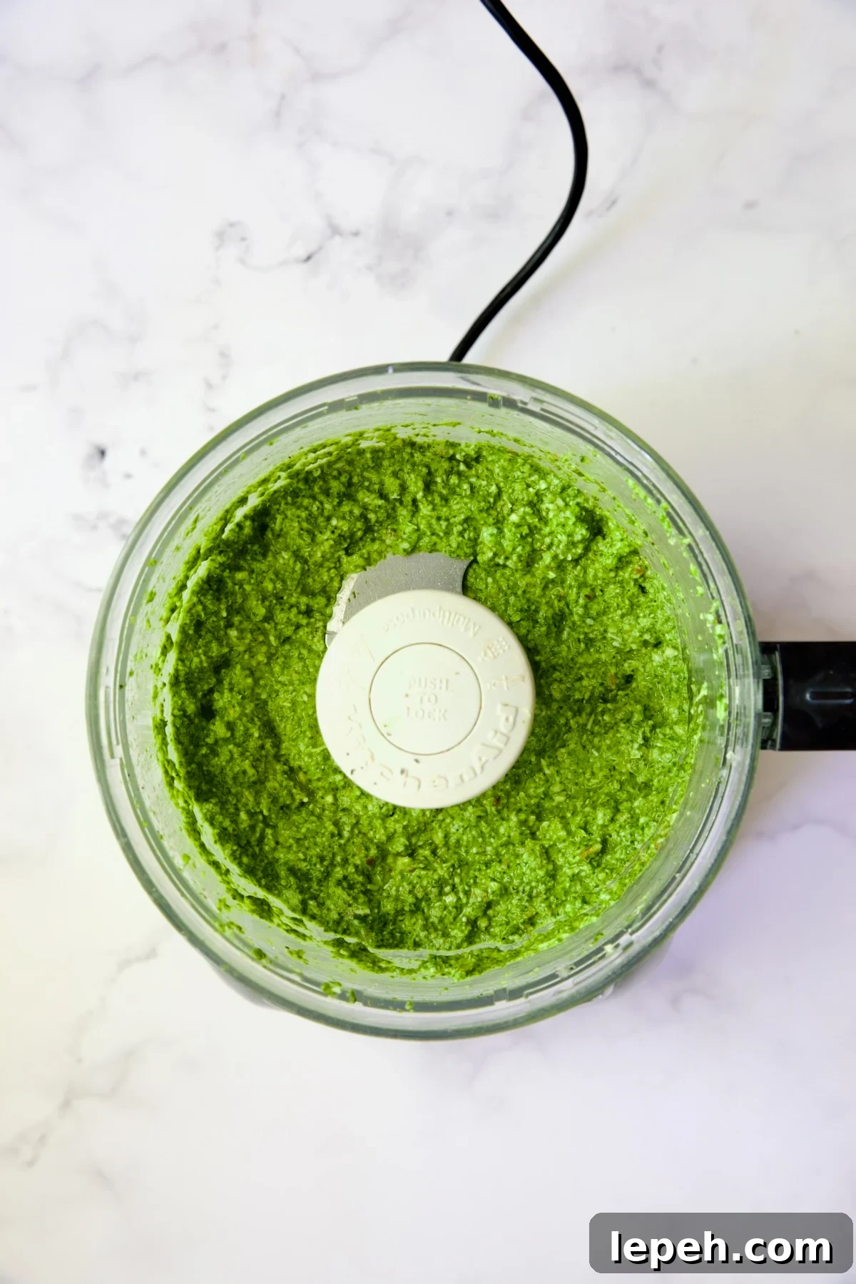 Finished pesto in food processor.