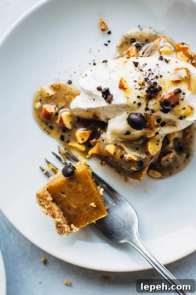 No bake pumpkin tart with salted coffee caramel that is paleo and dairy free! SO easy to make and packed full of fall flavors, this dessert is sure to please everyone at your table!