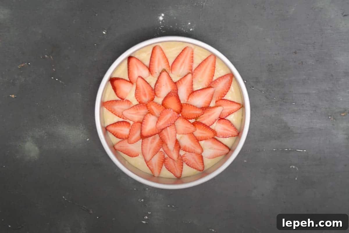 Topped with strawberry slices.