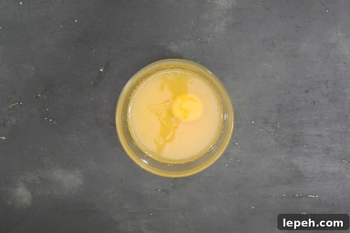 Eggs added to the bowl.