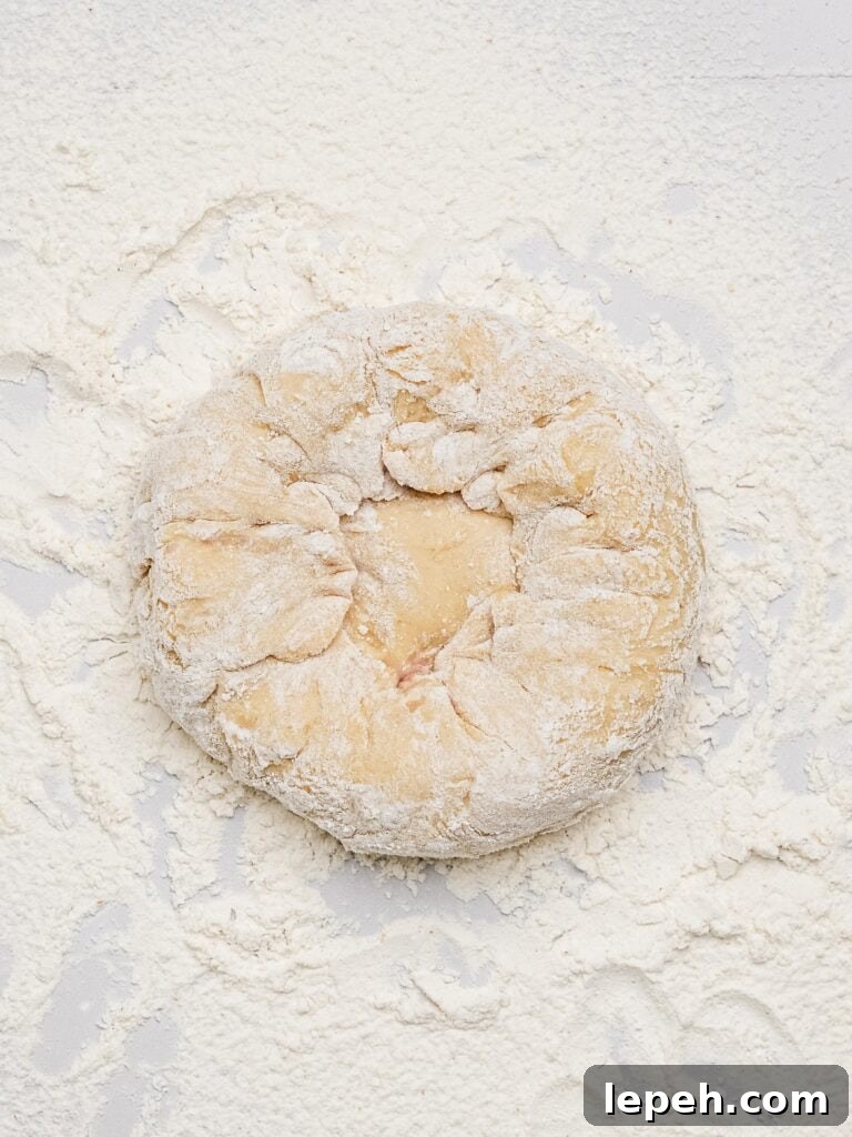How to shape a blueberry bagel.