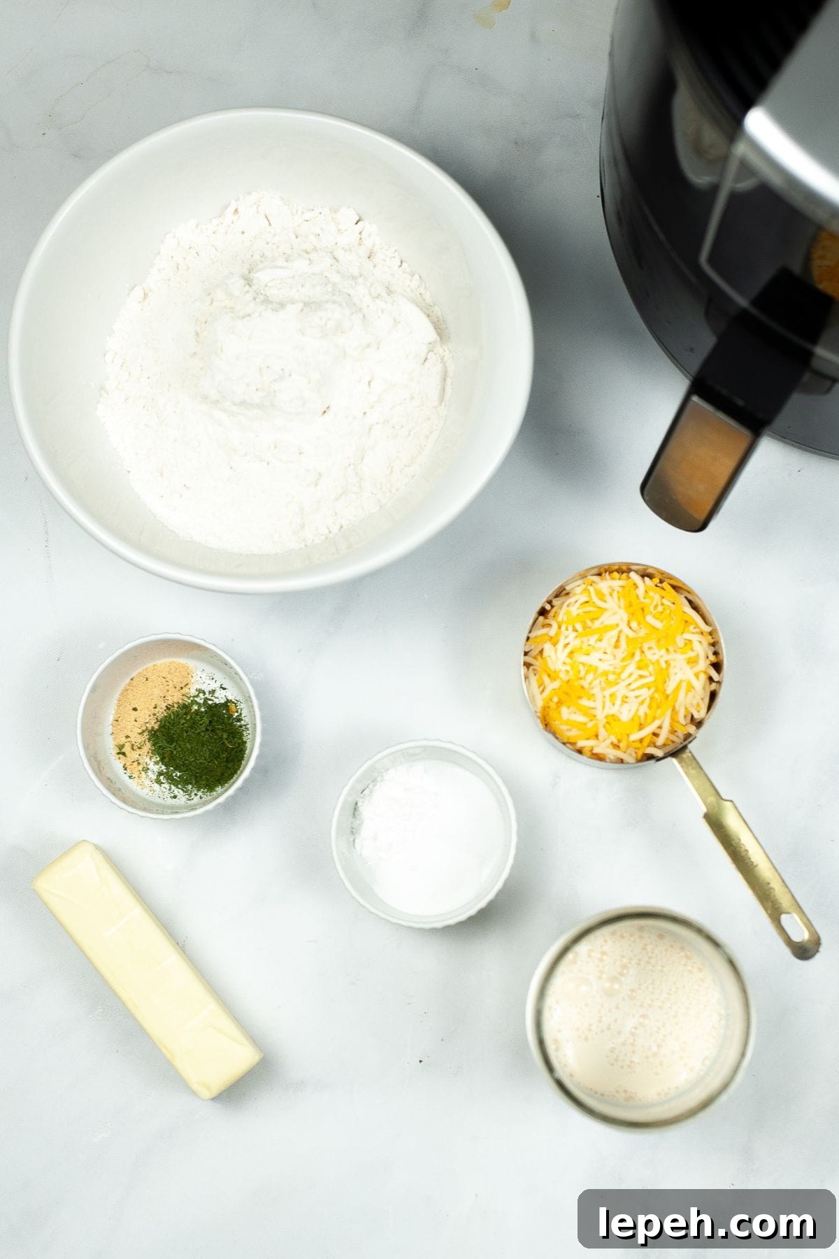 Flour, cheese, butter and spices.