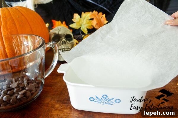 line a baking dish with parchment paper for this Halloween dessert recipe