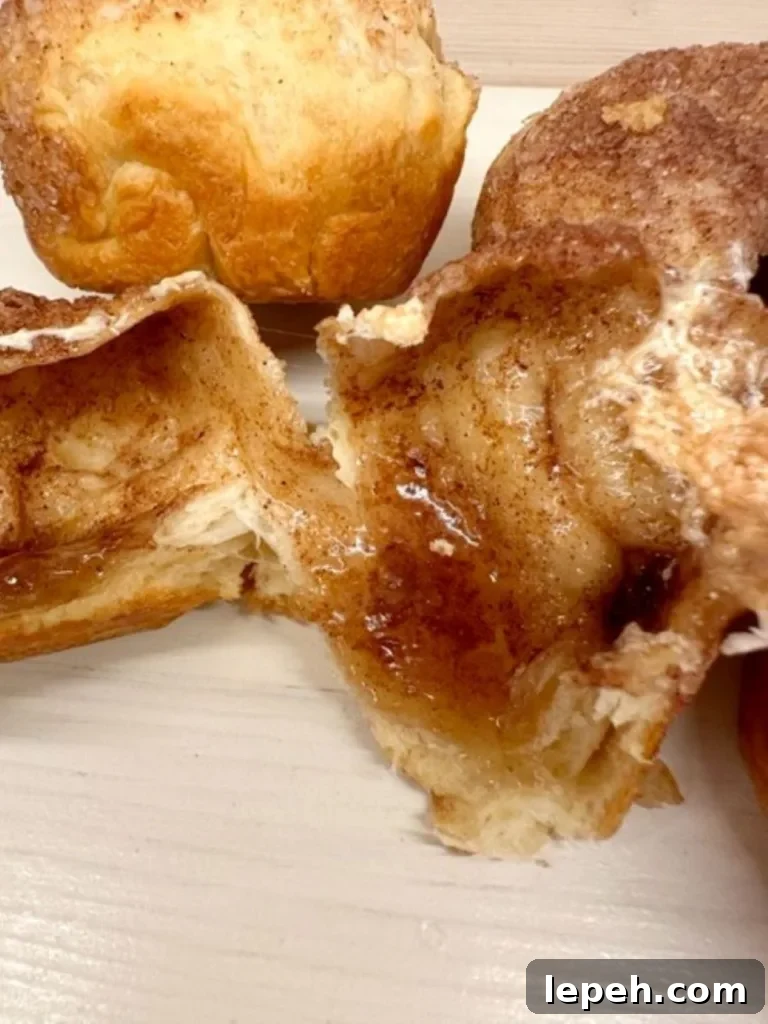 Golden baked Hocus Pocus Buns with melted marshmallows inside — fun, easy Halloween treat recipe for kids from GB’s Kitchen