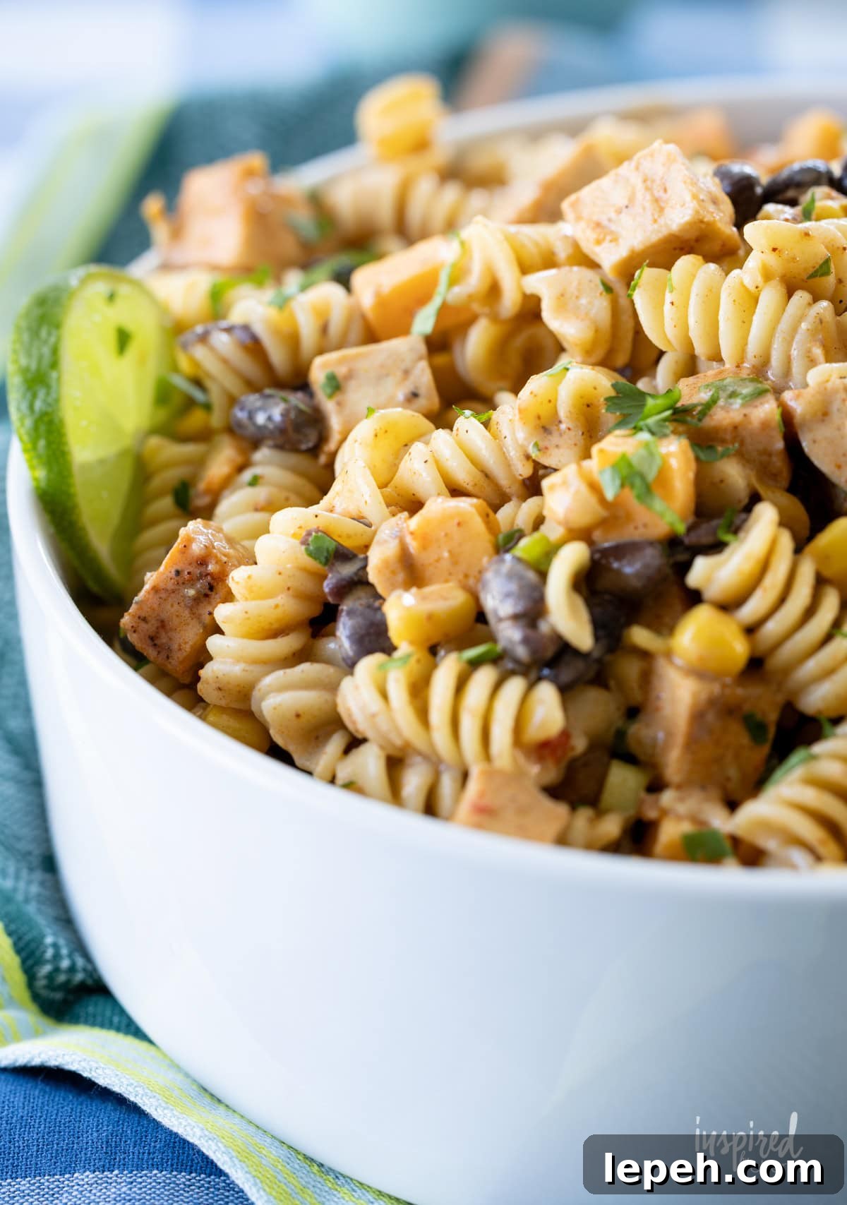 white bowl filled with Southwest Chicken Pasta Salad.
