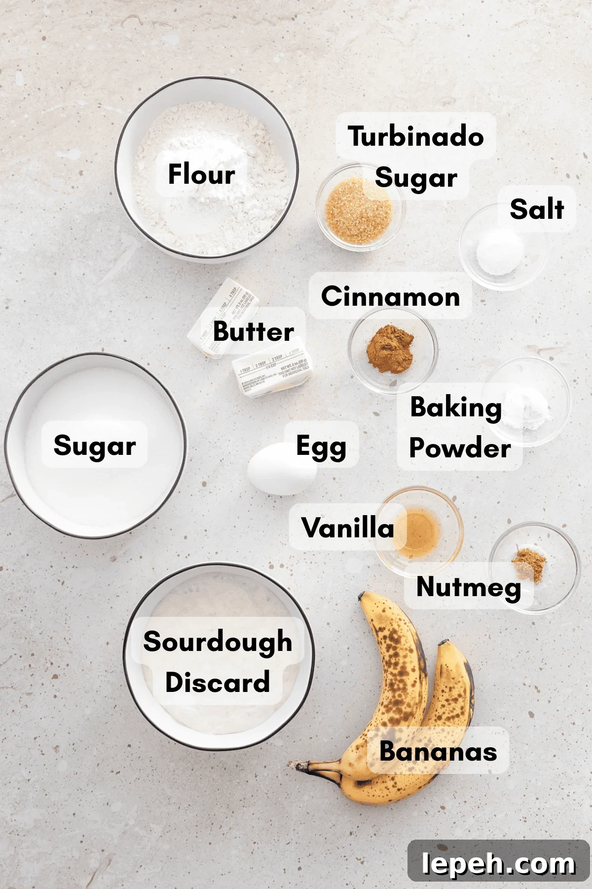 Ingredients for Sourdough Discard Banana Muffins in small bowls.