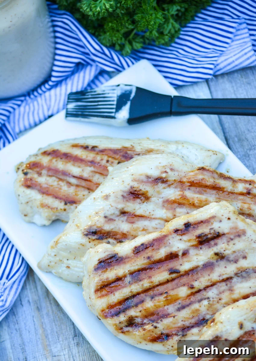 grilled chicken spread with white barbecue sauce