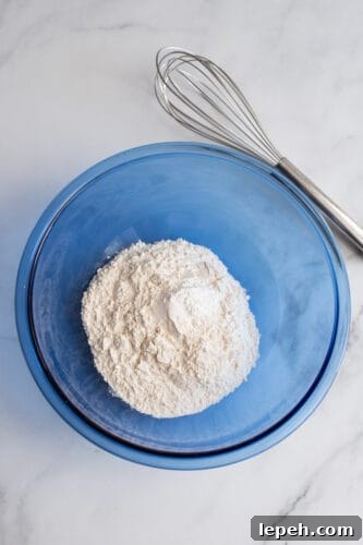Flour in large mixing bowl.