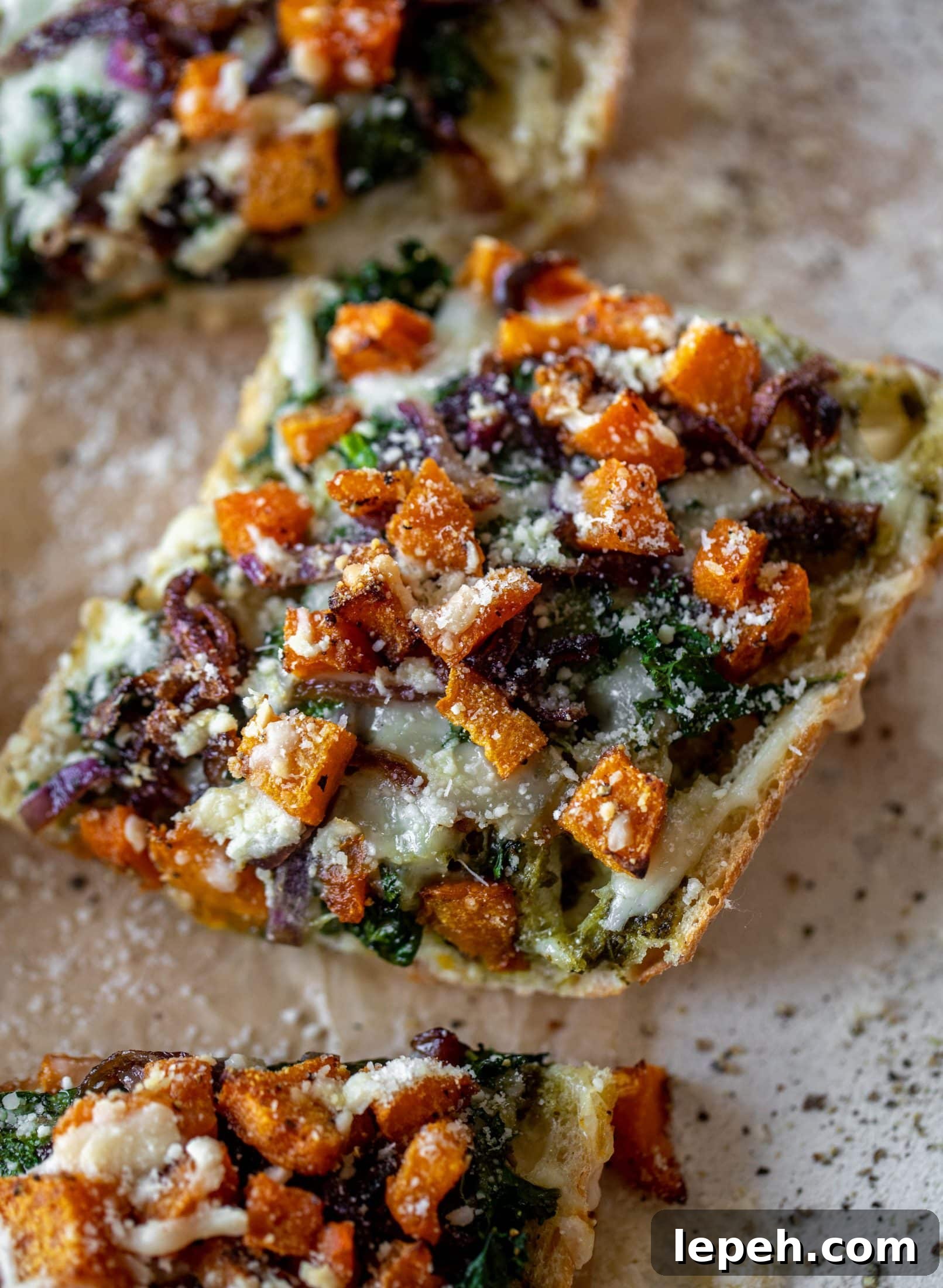 These butternut squash french breads have so much flavor. Pesto, caramelized onions, kale, roasted butternut and tons of fontina cheese. Delicious!