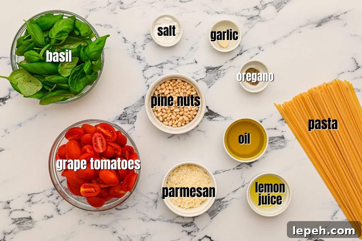Ingredients for Pesto pasta labeled on counter.
