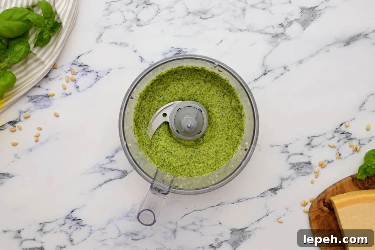 Homemade pesto in food processor.